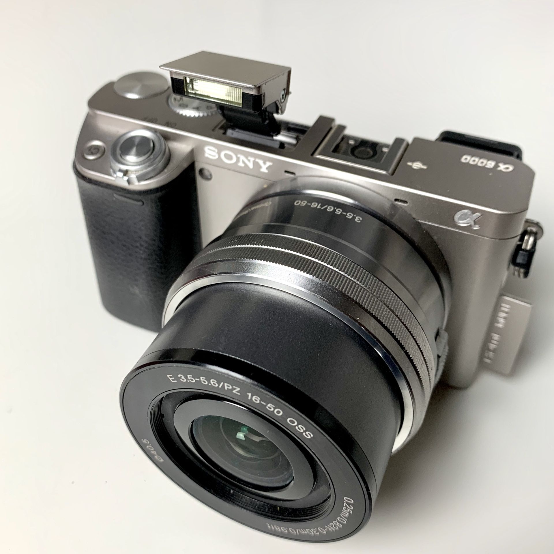 Sony Alpha A6000 Digital Camera Silver (with original 16-50mm lens and extra batteries)