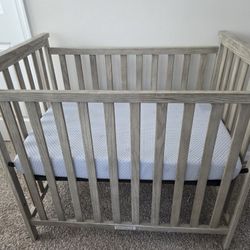 Delta Children Mini Crib and Mattress