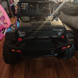 Electric powered ride on Jeep