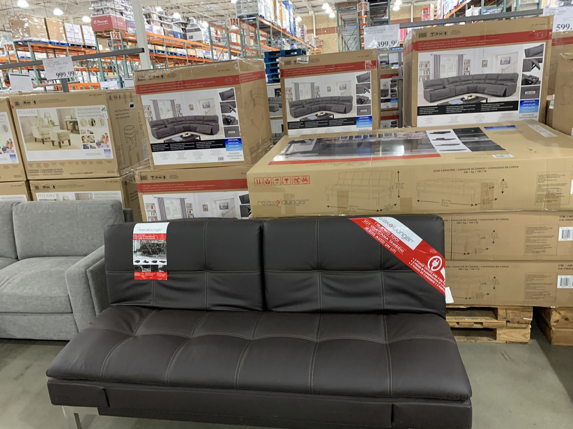 Leather couch (Brown Futon) with usb and power ports.