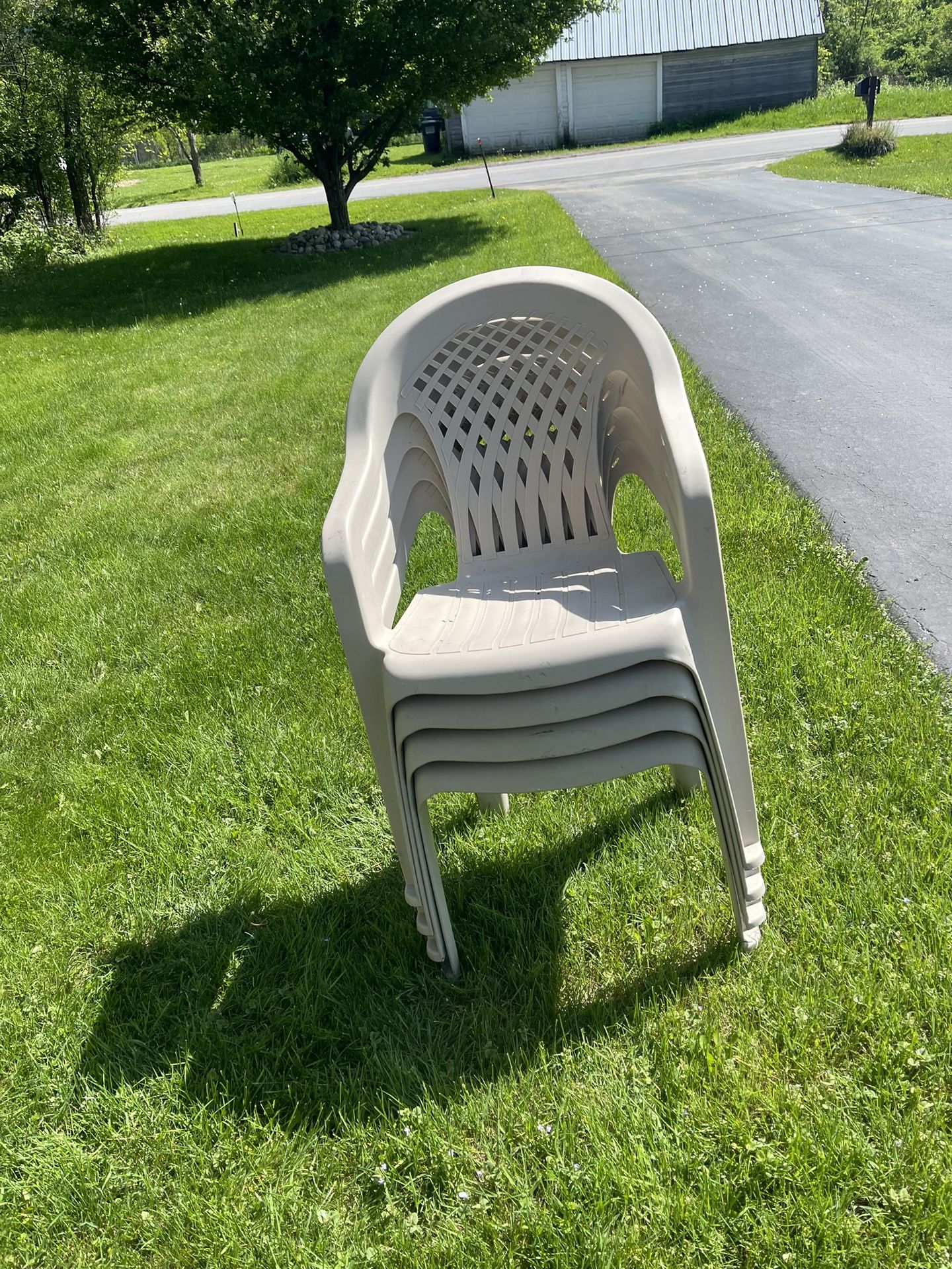 Lot Of 4 Stacking Outdoor Chairs