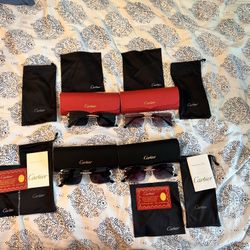 4 pairs of cartier glasses BRAND NEW!