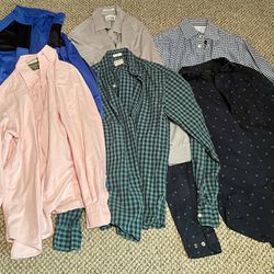 Bundle of new condition jackets, shirts, pants, and shoe