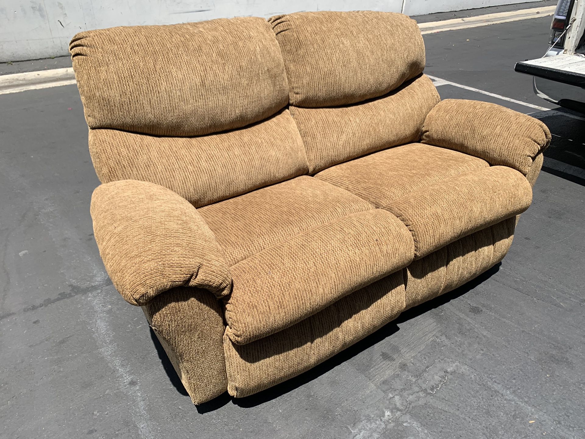 Brown fabric reclining sofa very clean and good condition