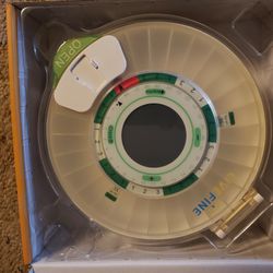Pill Dispensary With Alarm