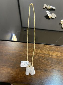 10k gold chain with real diamond pendant initial “M” for a good price!