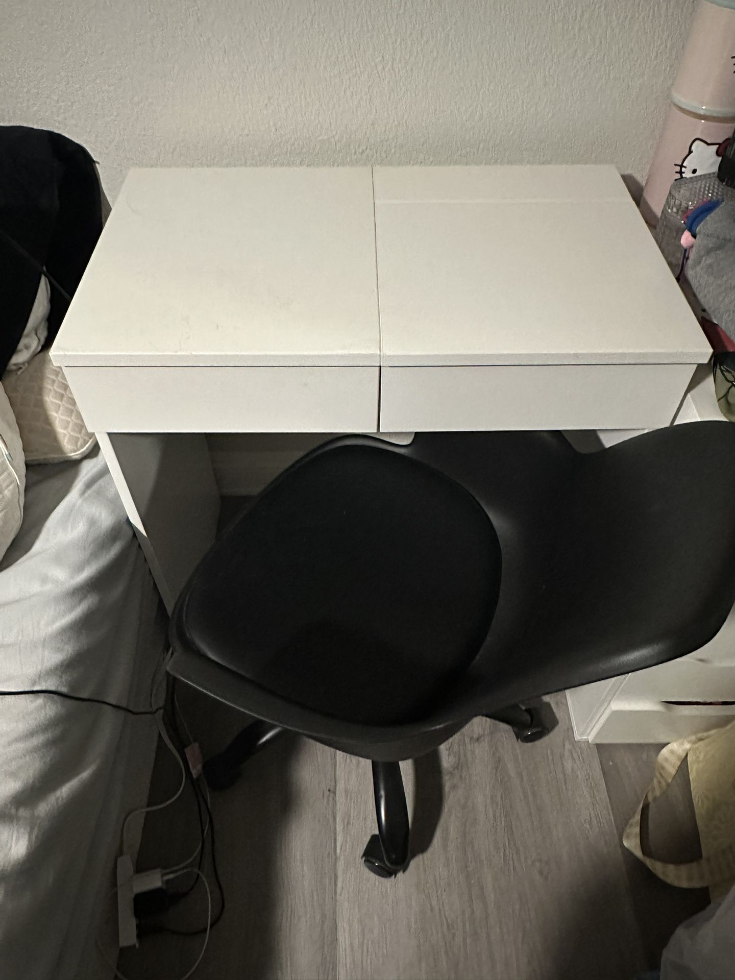 White Ikea Vanity and Black Chair