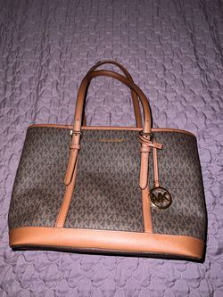 Michael Kors Jet Set Travel-style large tote in the brown MK Signature monogram