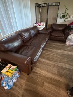 Leather couch and love chair