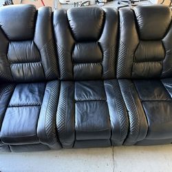 Leather  powered reclining Sofa