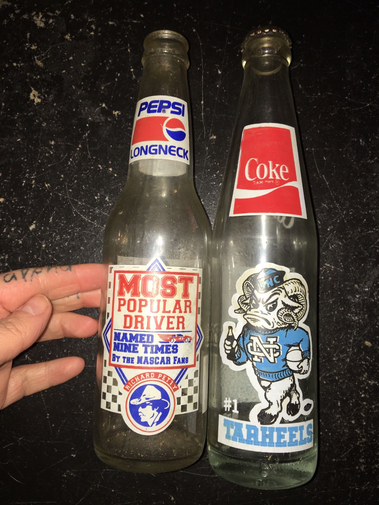 you get both - Richard petty Pepsi bottle and North Carolina Tar Heels coke bottle