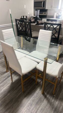 Glass table - chairs not included.