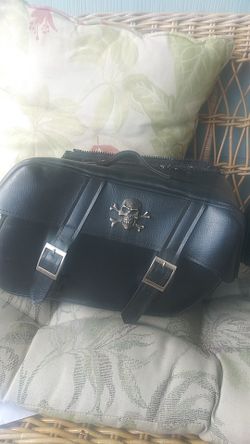 Two Motorcycle bags. Strap missing that slings over the bike, but still great bags.