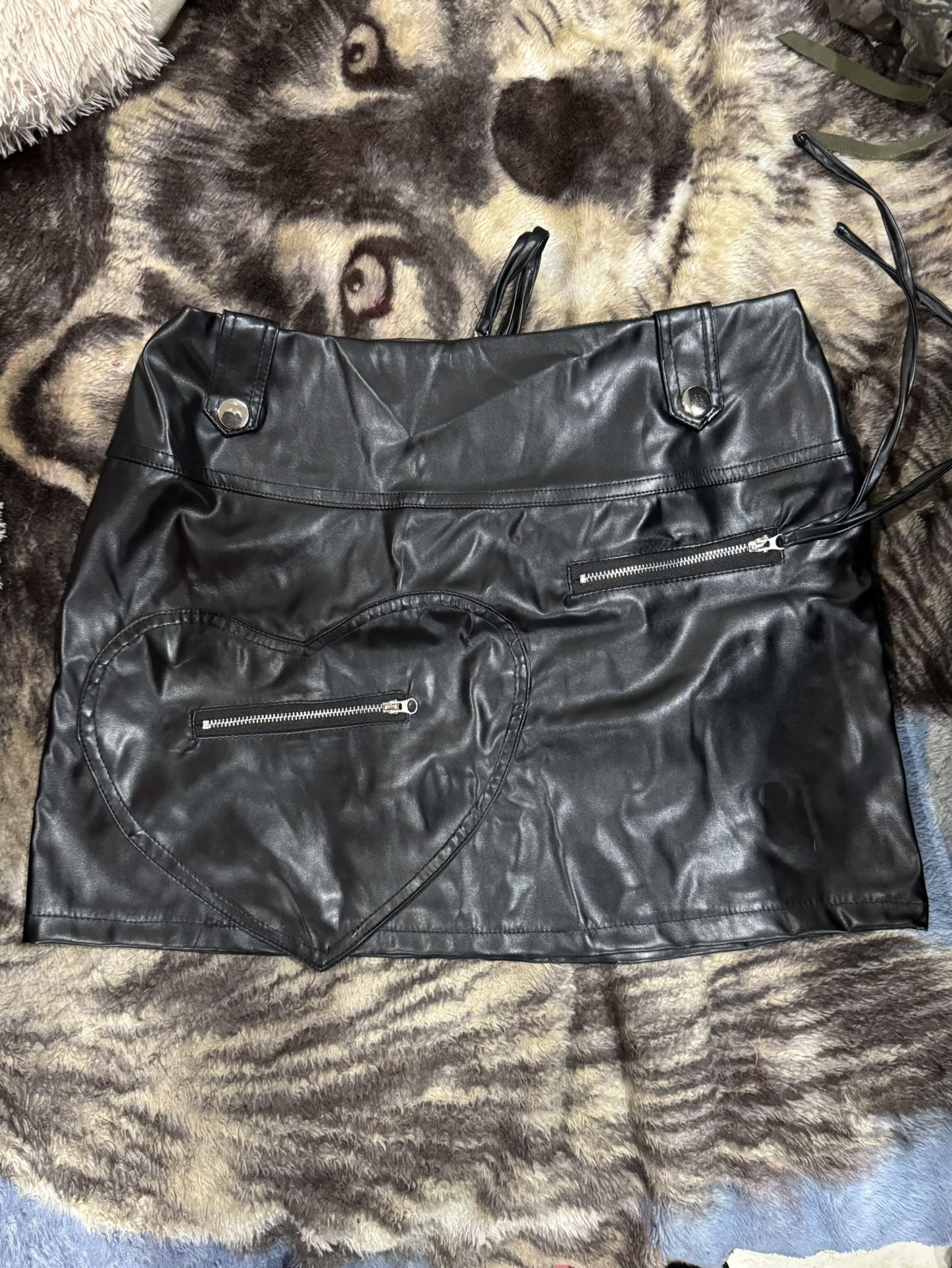 Black leather heart mini skirt