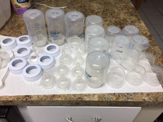 Set of eleven Avent bottles