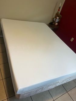 Queen bed mattress, box spring and adjustable metal frame on wheels