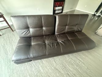 Free- Costco sofa folds down to a bed.
