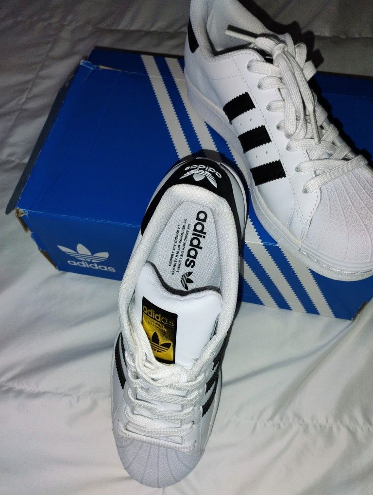 white leather with black stripes Adidas size 8 and 1/2 New in Box