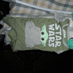 Baby Clothes And Rocker Chair