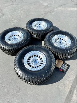 Brand New KMC IMS 17x8.5 Wheels and 35/12R17 All Terrain Tires 6x139 -10 Offset