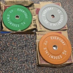 Brand new 100lb bumper plate weight set