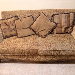 Two Long Solid Wood Vintage Sofas with 2 side tables.  Rarely used.