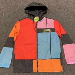 New Nickelodeon Teenage Mutant Ninja Turtles mens size large hooded polyester Windbreaker Jacket with full zip front.  It features a large graphic on 