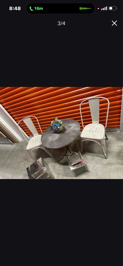 Set of metal chairs with coffee table or green chairs