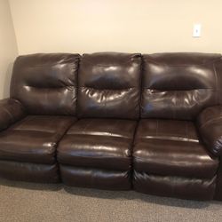 Gently used leather 3-seater couch purchased from RC Willey.