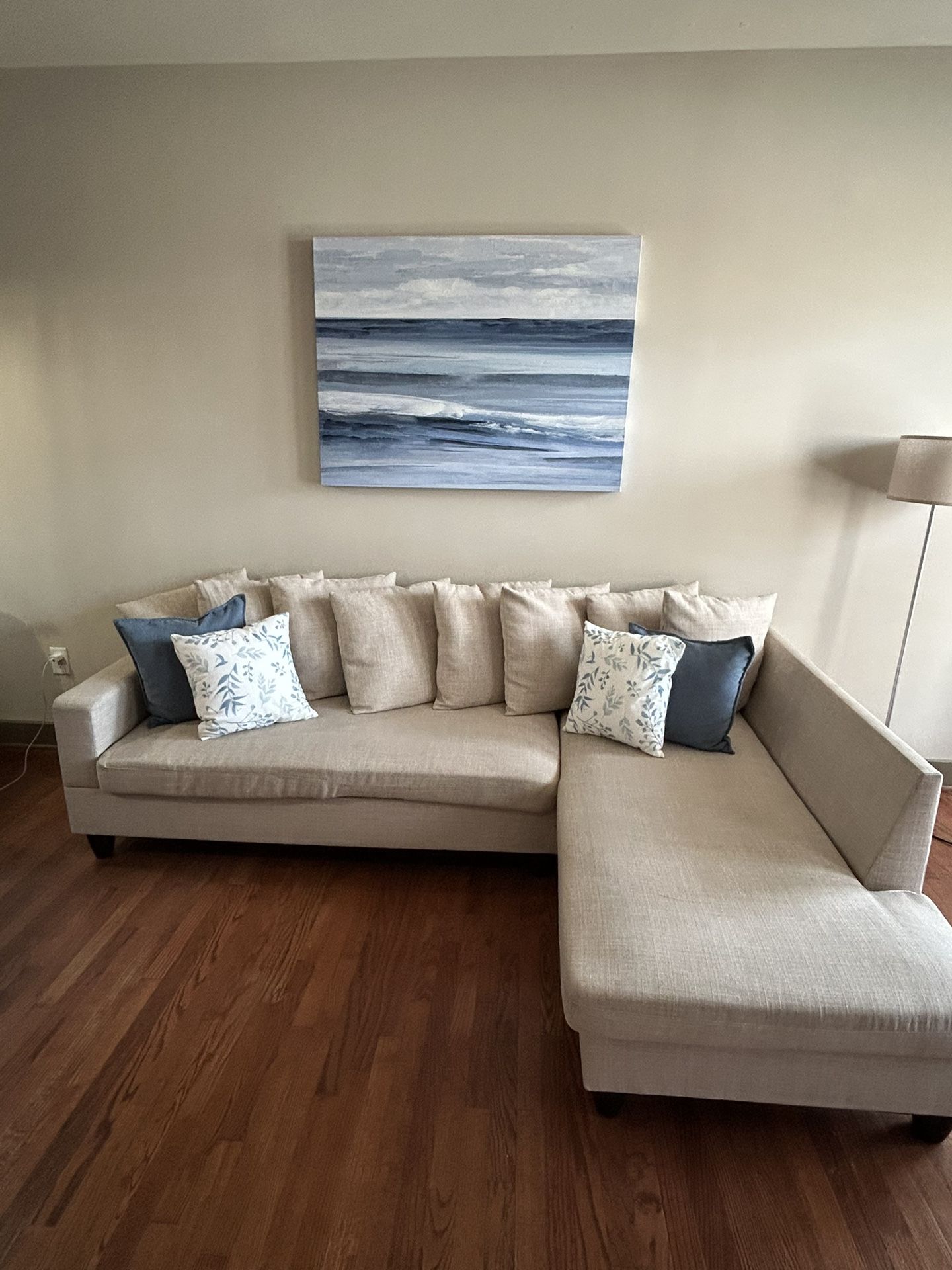 Neutral Beige Sectional + Coastal Canvas + Beige Bar Stools