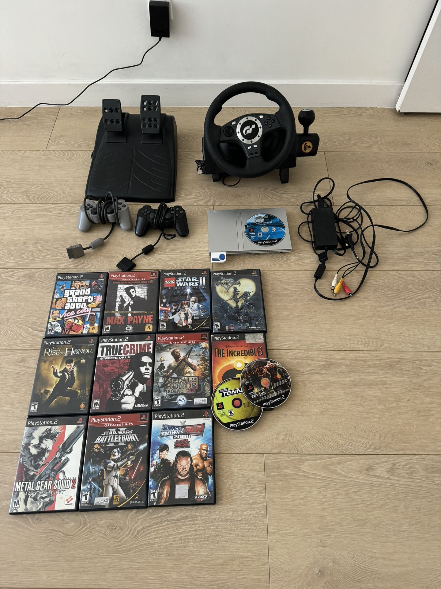 Sony PlayStation 2 PS2 Slim Silver 79001 Bundle Sim Cords Controllers Games