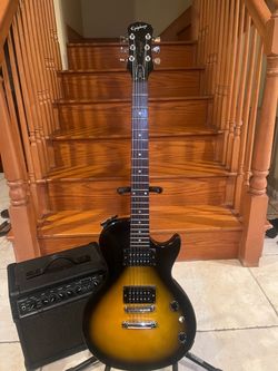 Epiphone Les Paul (Mint) w/ Line 6 Spyder V20 Amp