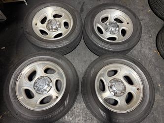 Ford Ranger or Explorer 16 Inch stock Aluminum rims and caps with old tires, 5x4.5 Lugs fits Titus Trucks and More