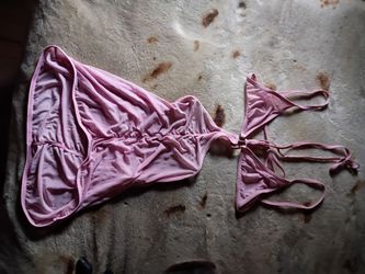 A Sexy Woman's Light Pink Lingerie