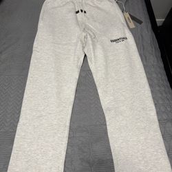 ESSENTIALS LIGHT OATMEAL FLEECE SWEATS