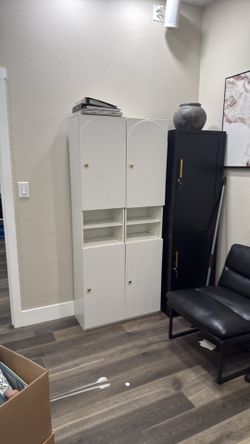 white fluted /arched design cabinet
