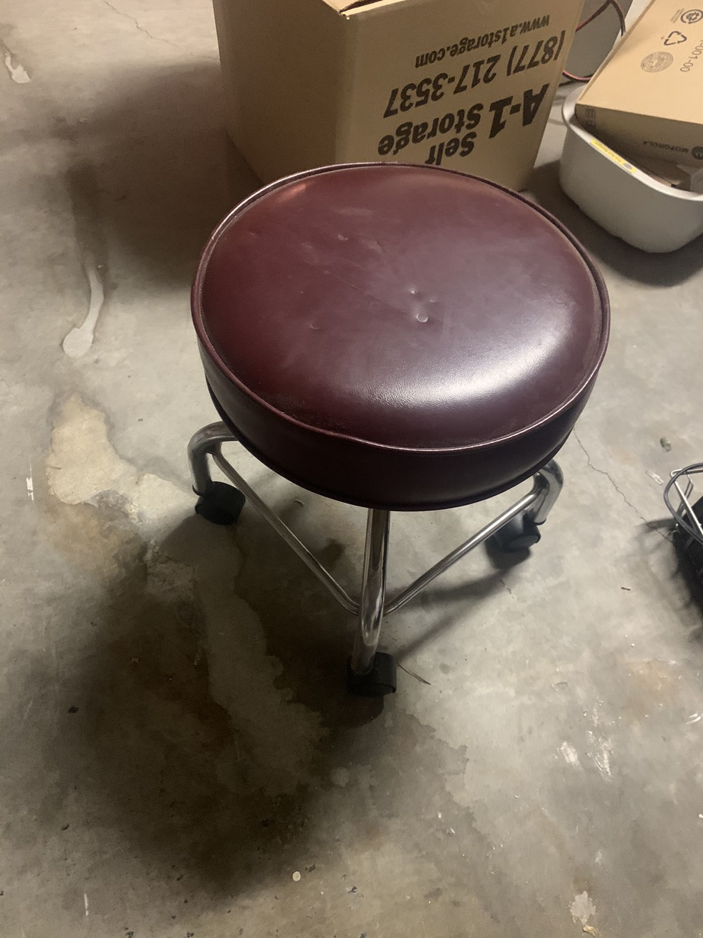 Vintage Chrome and burgundy leather rolling stool