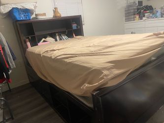 Full size bed with drawers and storage space