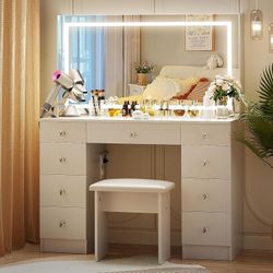 Vanity With Lighted Mirror - Makeup Desk With Power Outlet and 9 Drawers, 3 Color Lighting Modes Adjustable Brightness, 43" Table With Soft Cushioned 