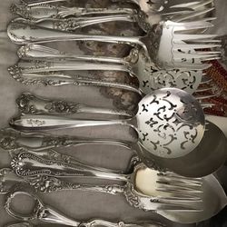 Assorted vintage silverplated serving pieces