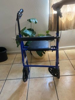 Blue Rollator Walker
