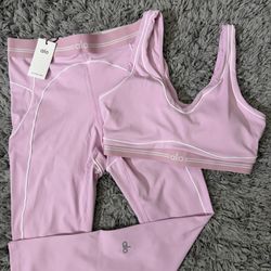 Pink Alo Yoga bra and leggings set