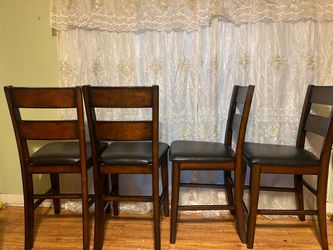 4 tall matching tall dining/ bar height chairs