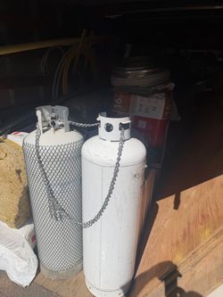 20 gal ( 100lb) propane tanks (2 of them) kept inside.