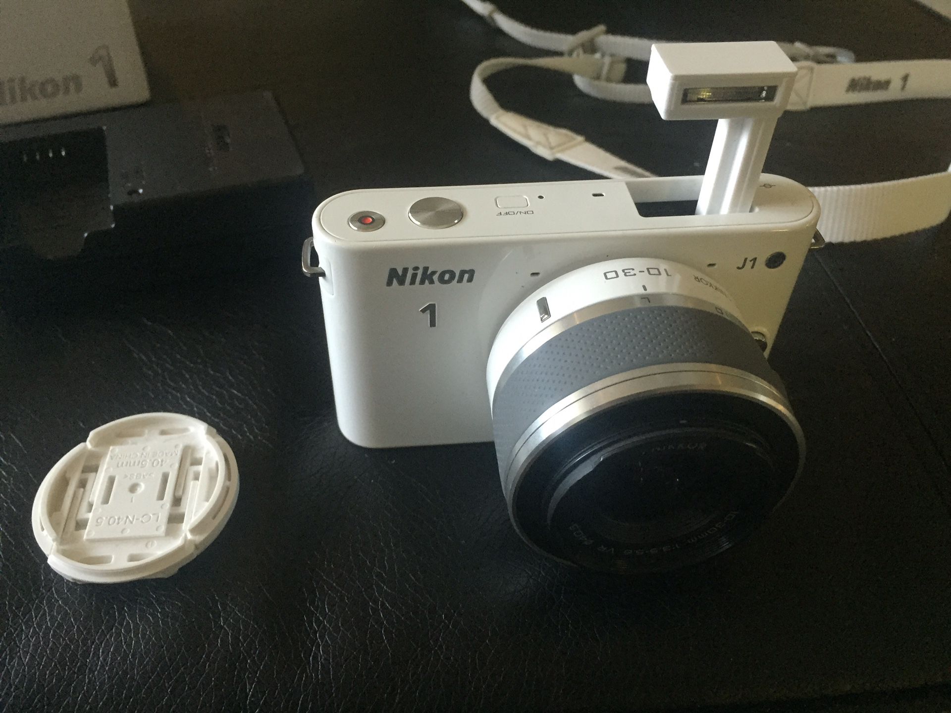 NIKON J1 series with 10-30M lenses