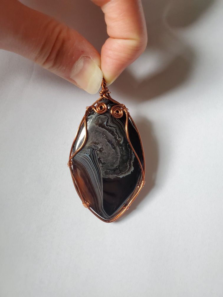 Black crazy lace agate wire wrapped pendant