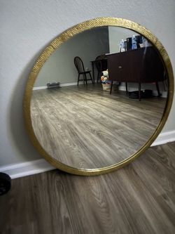 Gold wall mirror