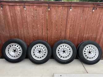 Ford OEM 17” Steel Wheels with Continental Tires 225/65R17 – Complete Set