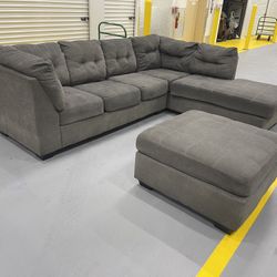 Gray Sectional Sofa and Ottoman From Ashley Furniture 