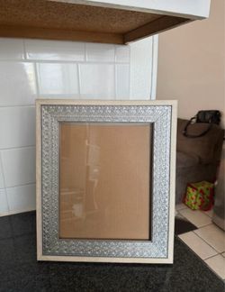 Big silver picture frame